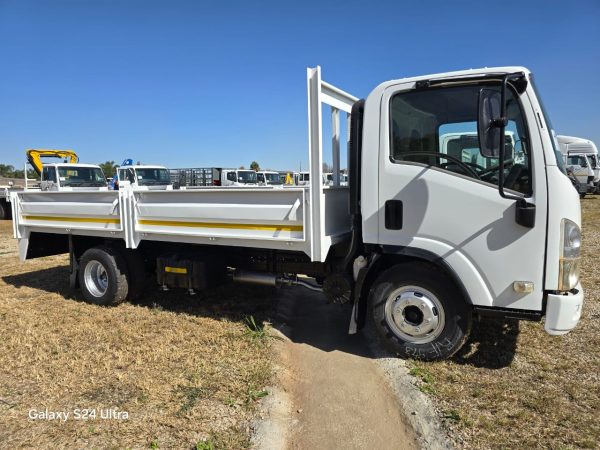 Used 2012 Isuzu NPR 400 Dropside Truck Auto - Image 11