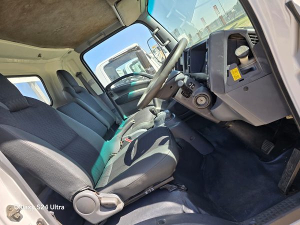 Used 2012 Isuzu NPR 400 Dropside Truck Auto - Image 10