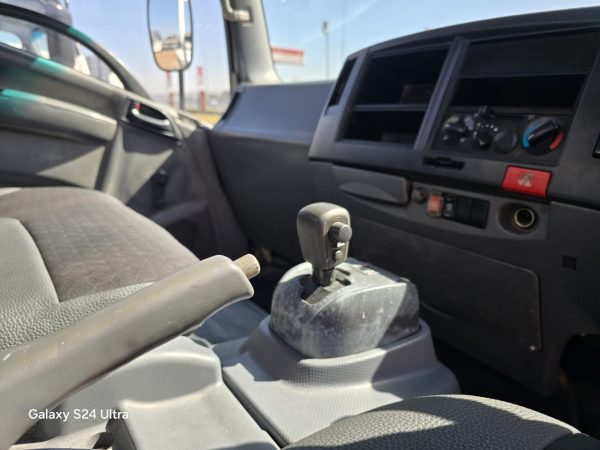 Used 2012 Isuzu NPR 400 Dropside Truck Auto - Image 9