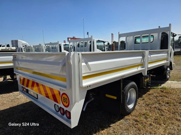 Used 2012 Isuzu NPR 400 Dropside Truck Auto - Image 6