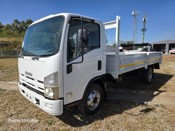Used 2012 Isuzu NPR 400 Dropside Truck Auto - Image 3