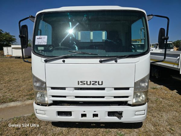 Used 2012 Isuzu NPR 400 Dropside Truck Auto - Image 2