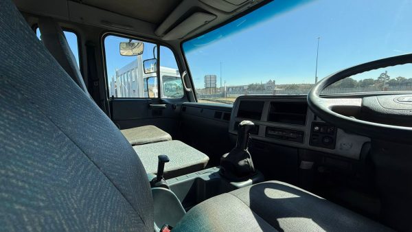 NISSAN UD 100 DROPSIDE - Image 8