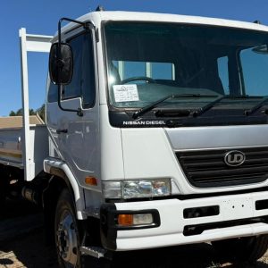 NISSAN UD 90 DROPSIDE