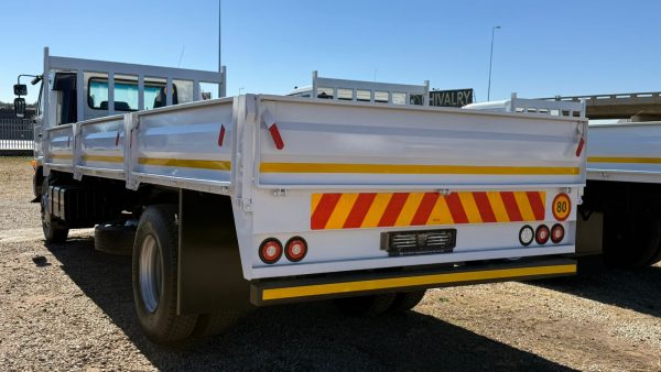 NISSAN UD 100 DROPSIDE - Image 10